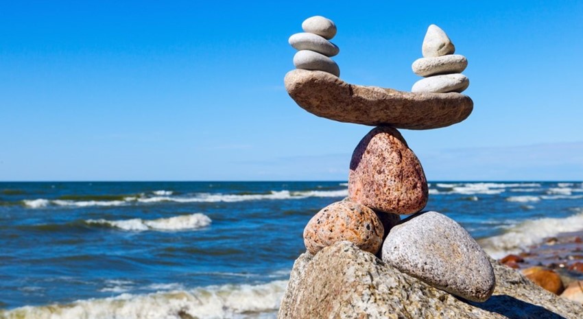 Balancing rocks on a beach