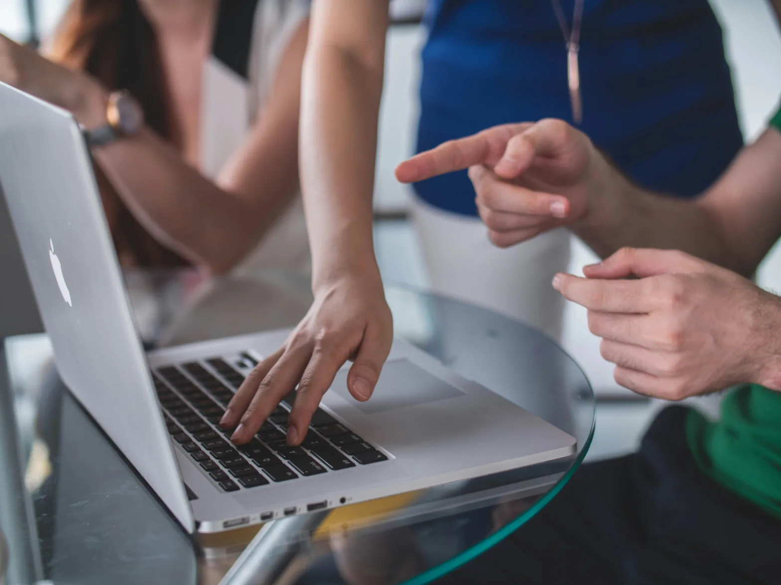 Group of woman around laptop having a discussion