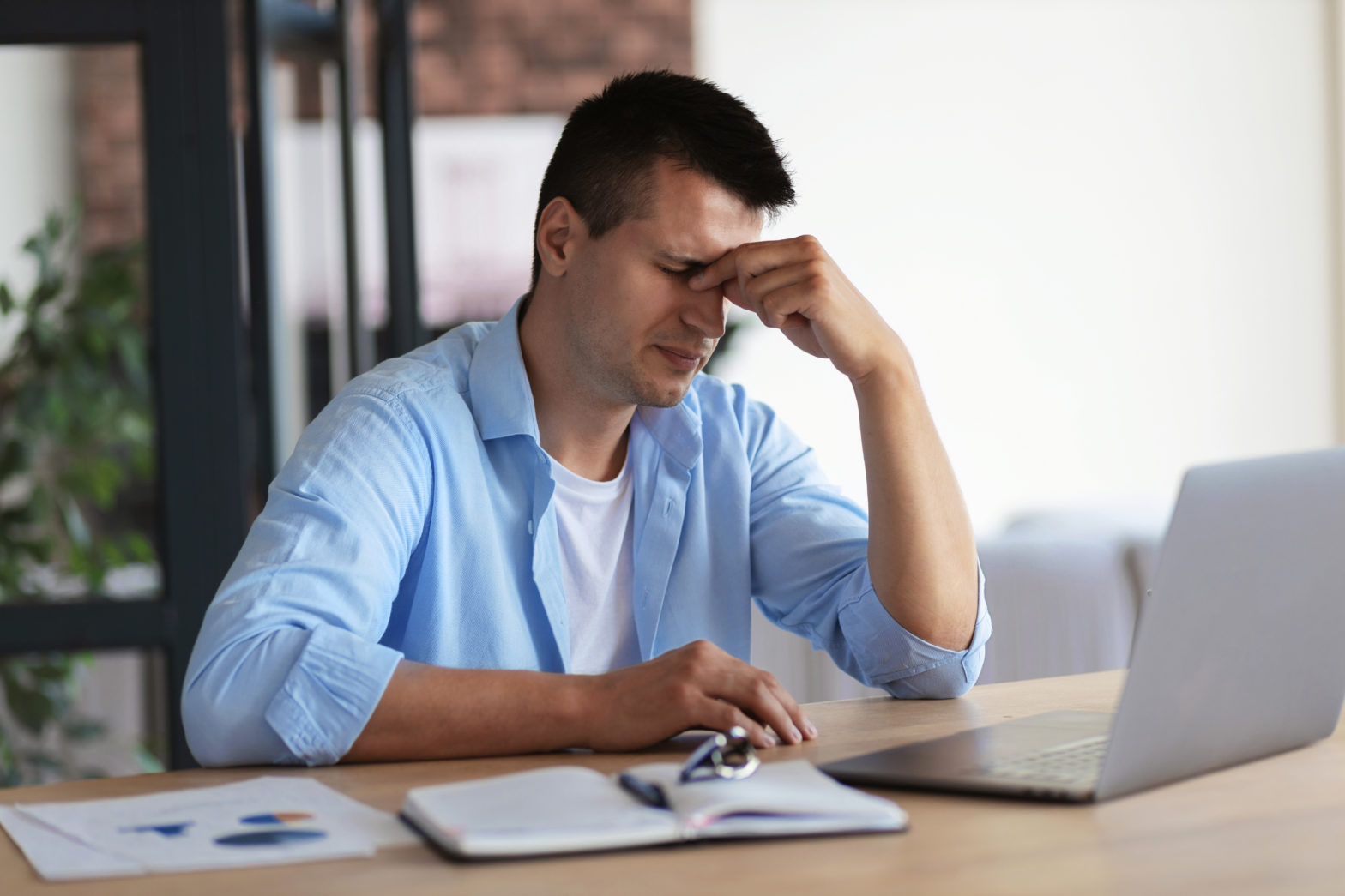 frustrated business owner at his computer