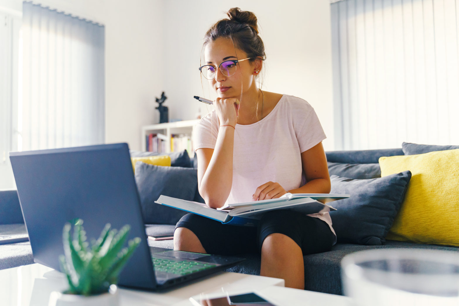 woman learning on her laptop