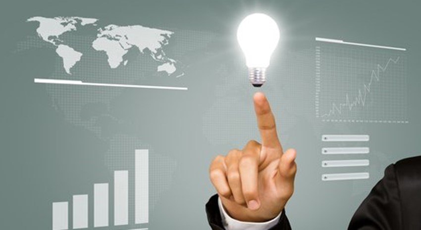 man pointing to light bulb with business insight icons