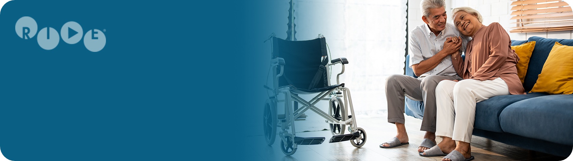 Couple with wheelchair and Ride Designs logo