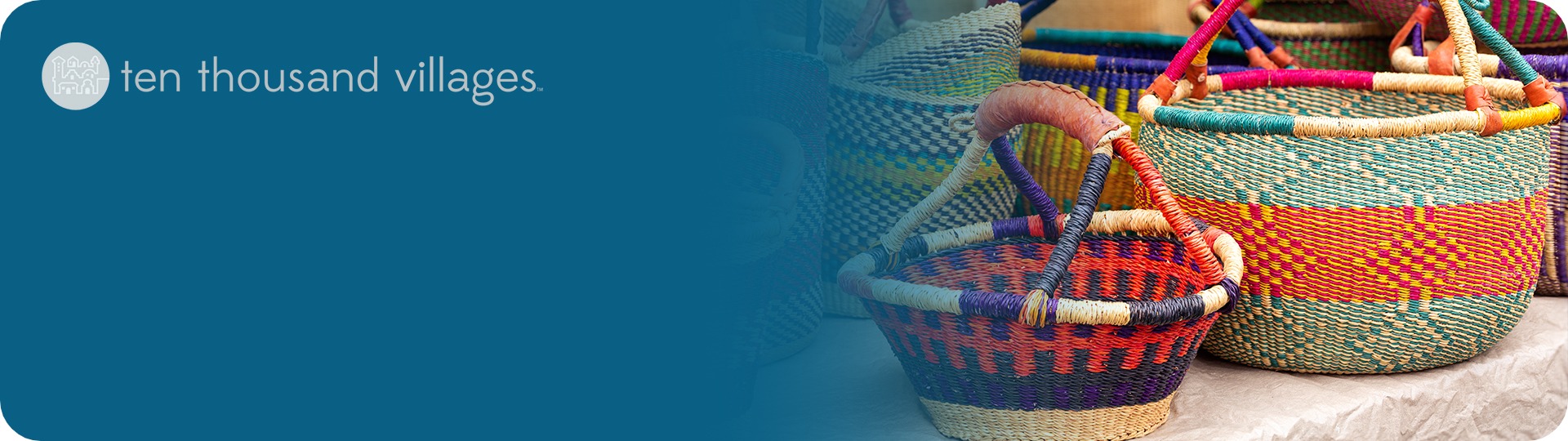 Hand woven baskets with Ten Thousand Villages logo