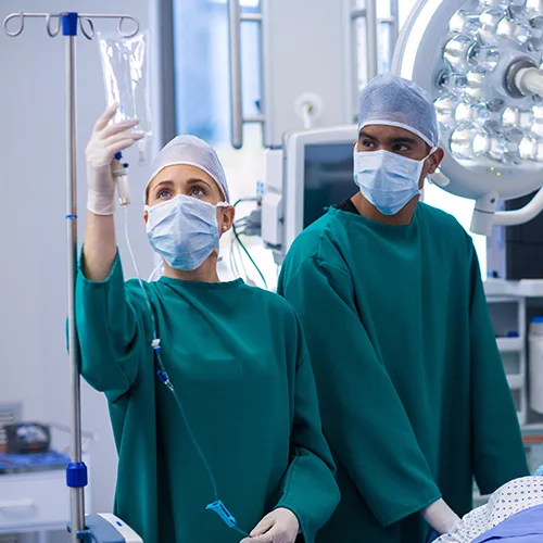 Doctors and nurses in operating room