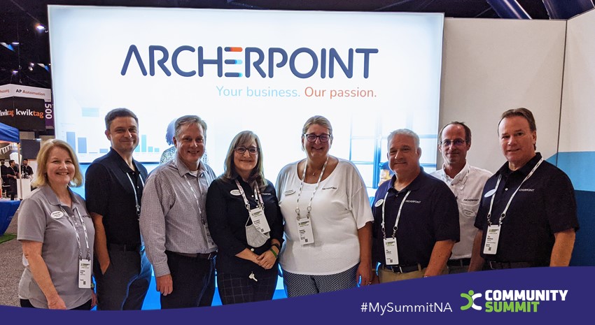 ArcherPoint team members at the ArcherPoint booth in the Summit NA 2021 expo hall