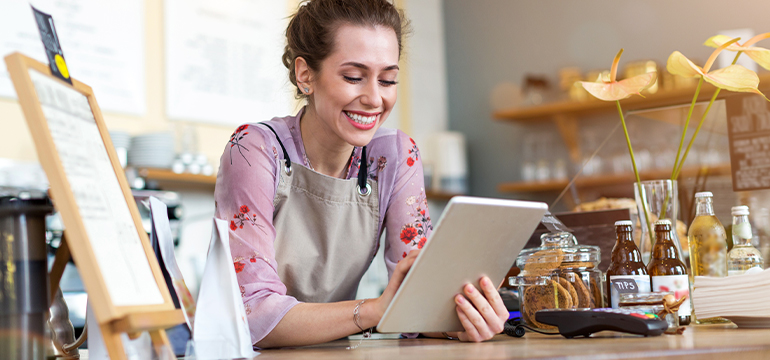 Female working at student coffee shop